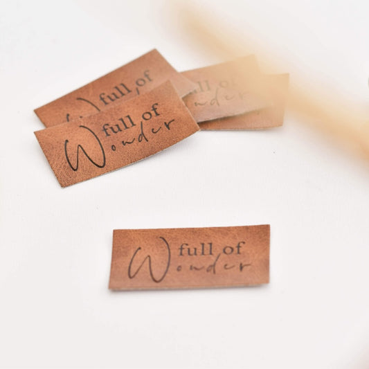 Kunstlederlabel "full of wonder"