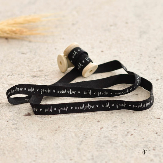 Designband schwarz "frech wild wunderbar"