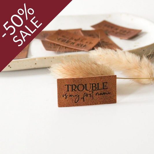 Kunstlederlabel "Trouble is my first name"