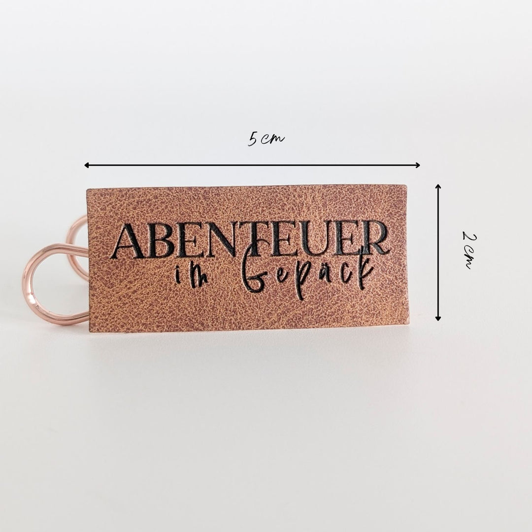 Kunstlederlabel "Abenteuer im Gepäck"