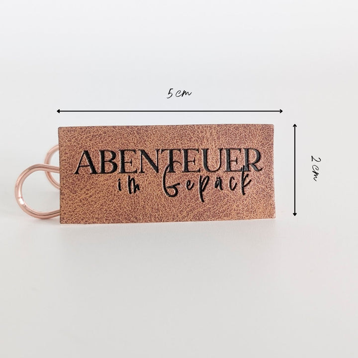 Kunstlederlabel "Abenteuer im Gepäck"
