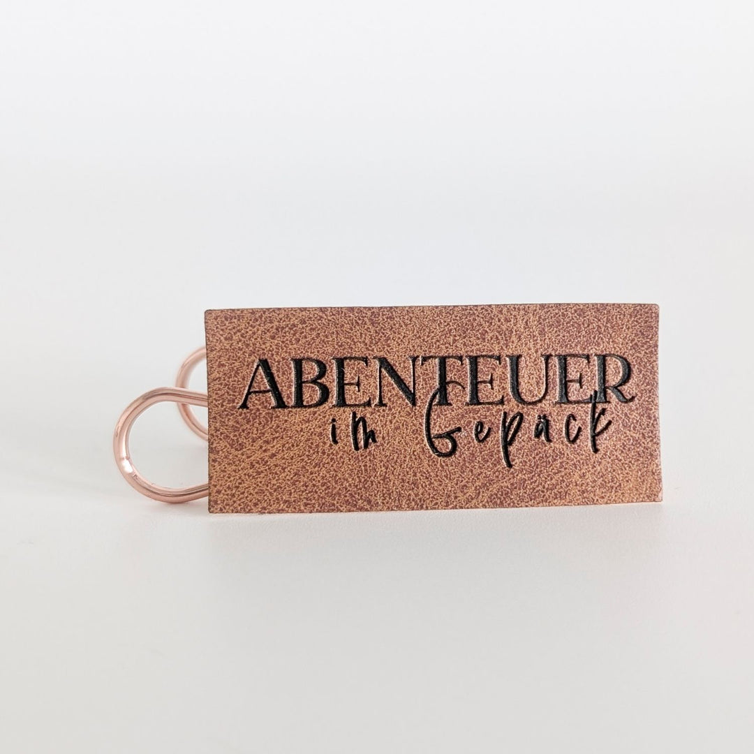 Kunstlederlabel "Abenteuer im Gepäck"