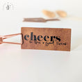 Bild in Galerie-Betrachter laden, Kunstlederlabel "cheers to the good times"
