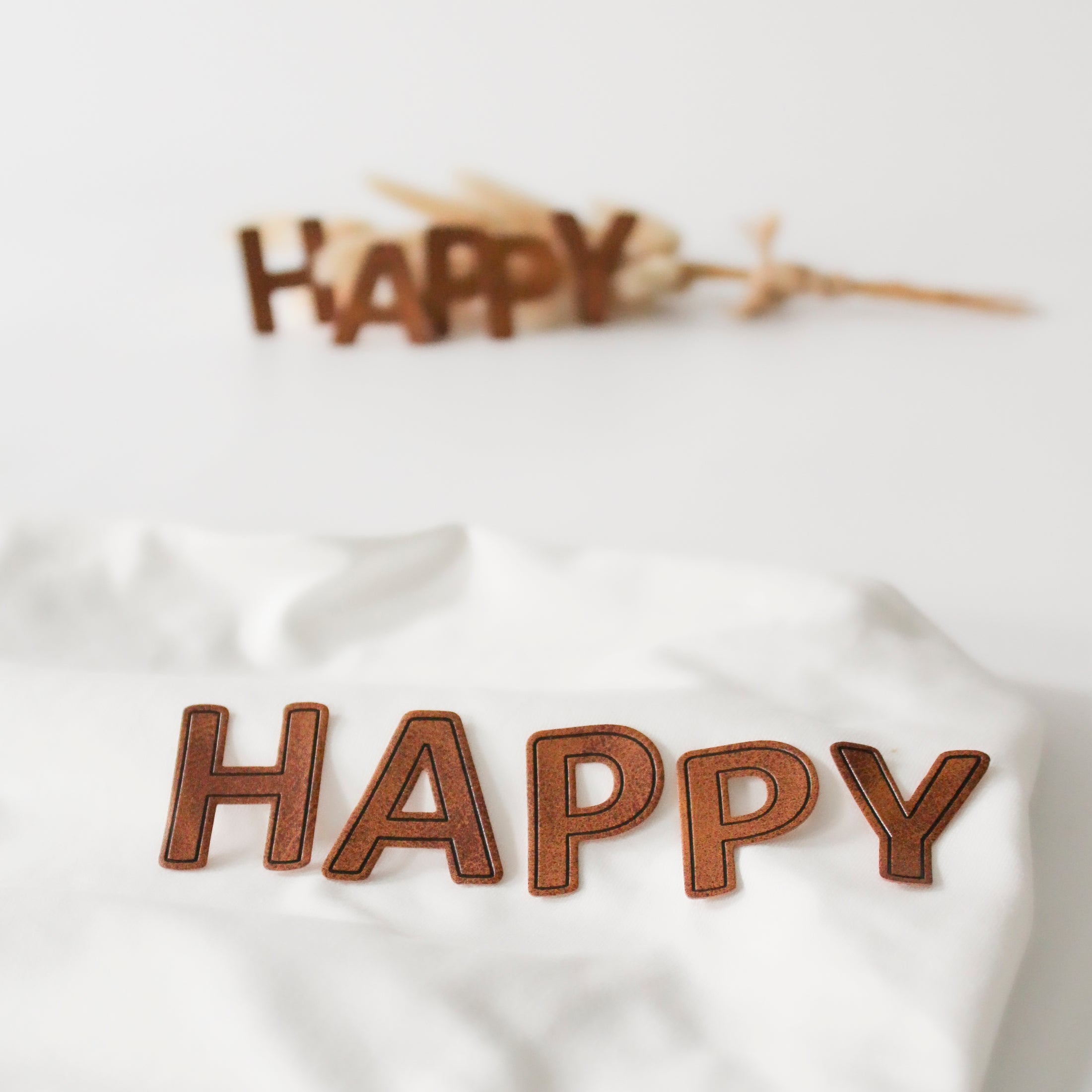 Kunstlederlabel Schriftzug "Happy"