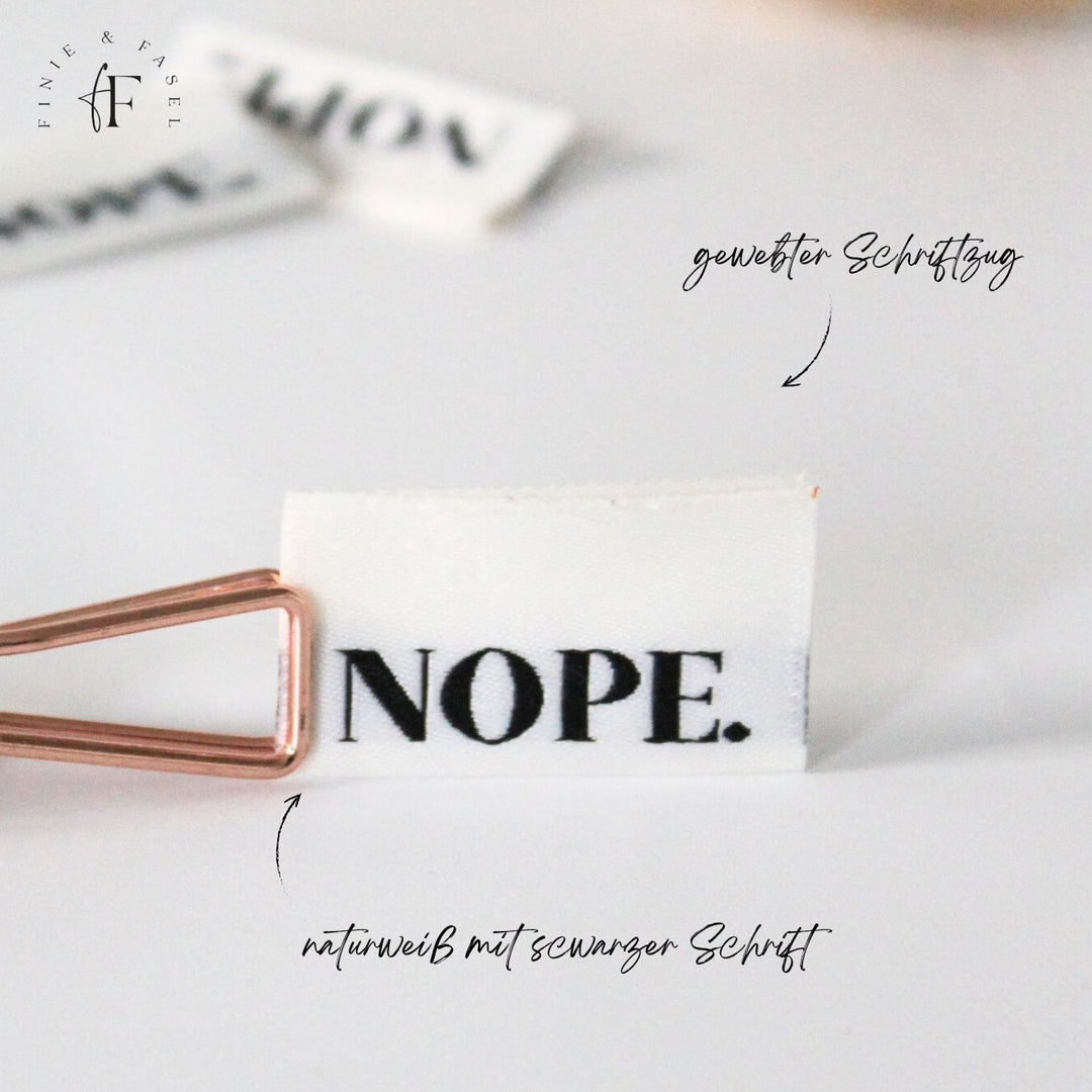 Weblabel cremeweiß "NOPE"