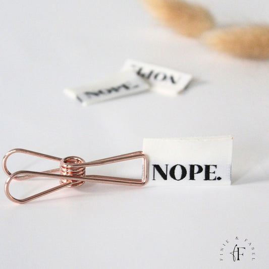 Weblabel cremeweiß "NOPE"