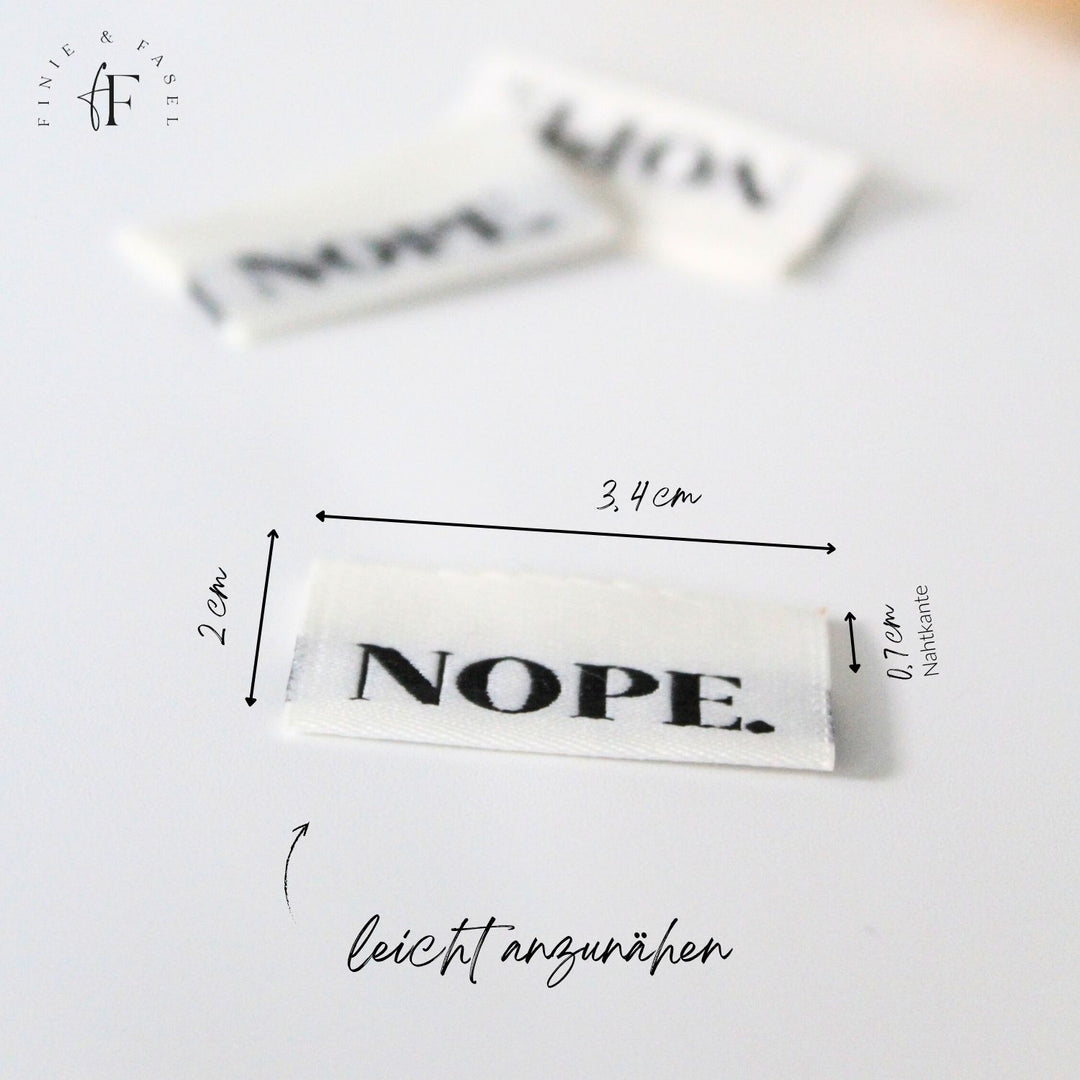 Weblabel cremeweiß "NOPE"