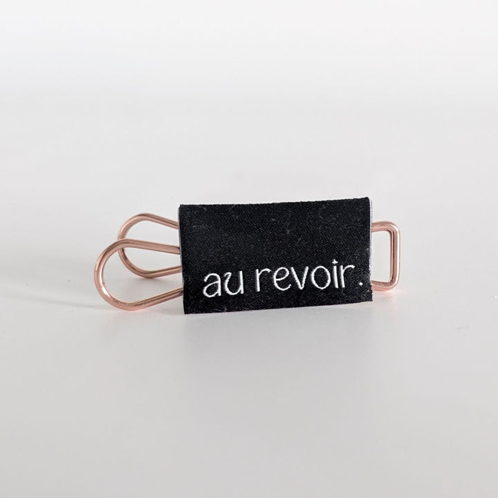 Weblabel schwarz "au revoir"