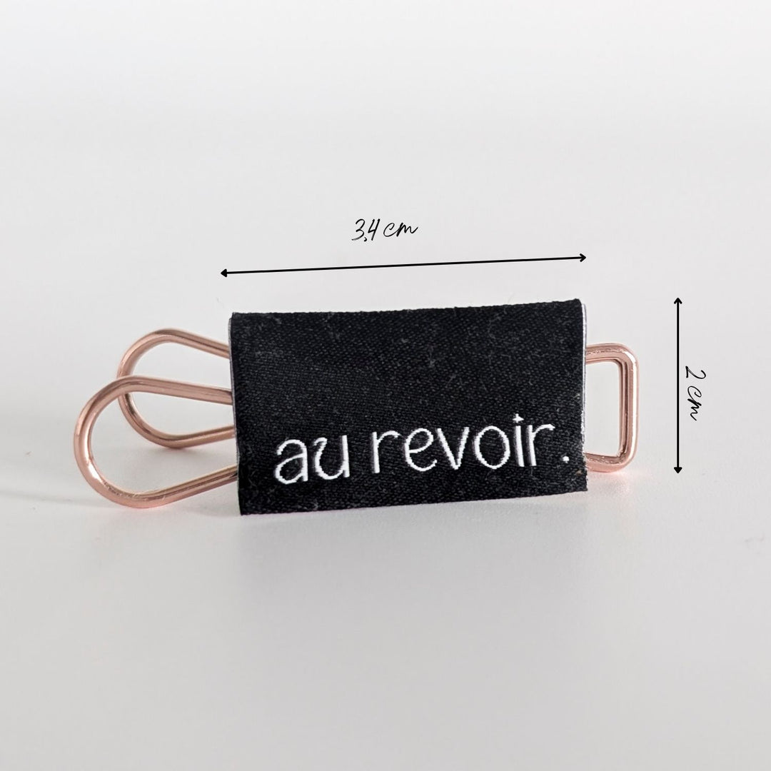 Weblabel schwarz "au revoir"