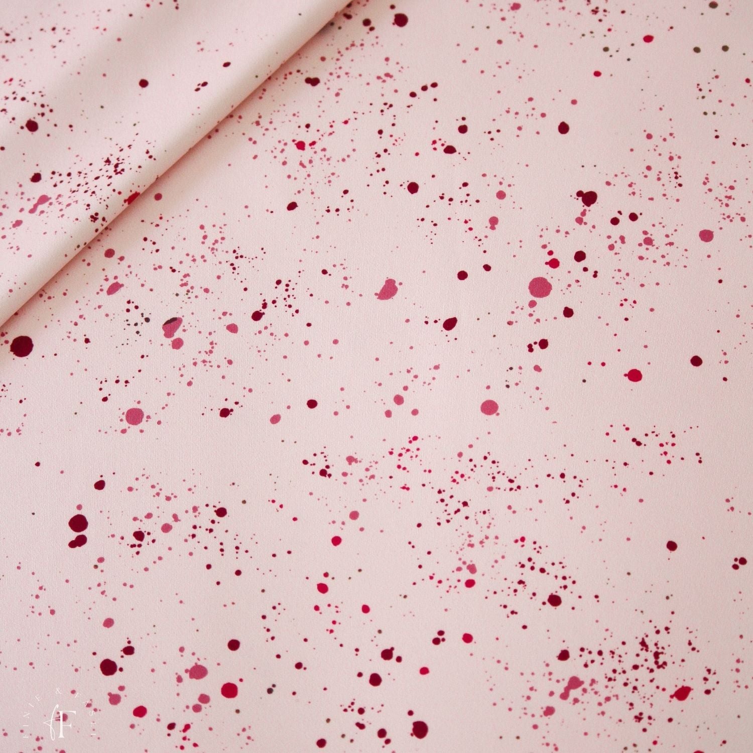 Lycra Stoff in Rosa mit Konfetti-Print – detailreiche Aufnahme des Materials in hochwertiger Qualität