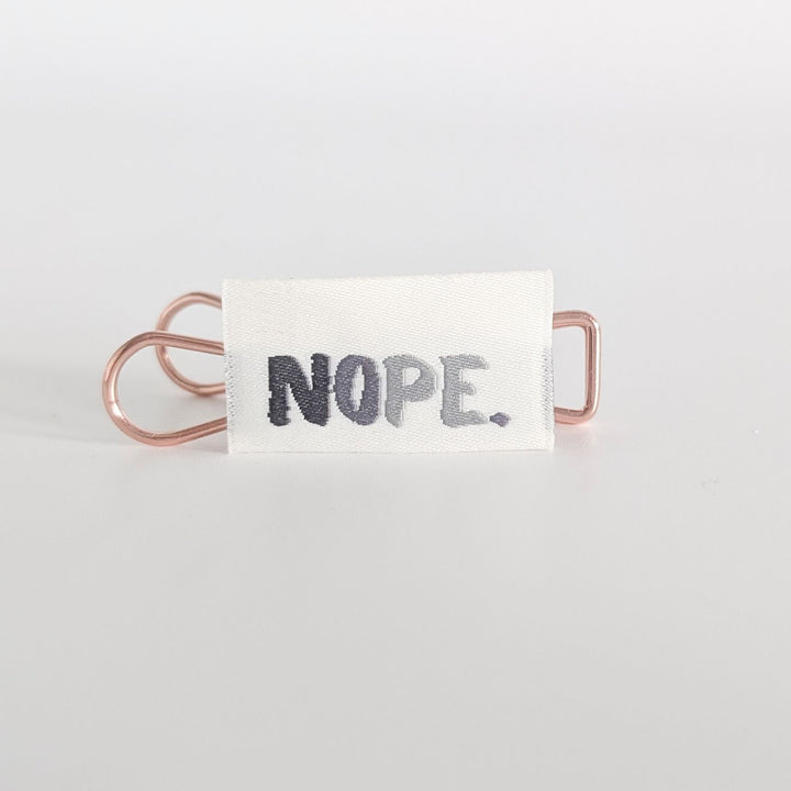 Weblabel "Nope" (grau)
